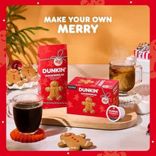 Dunkin’ gingerbread ground coffee bags on a wooden tray