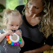 Octopus chillable rattle and teether with multicolor arms and circular face window