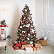 White plush tree skirt around base of decorated Christmas tree