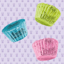 Wrapped mini peanut butter cups in blue, green, and pink
