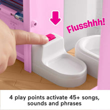 Playset toilet accessory with pink cabinet and a finger pressing a button