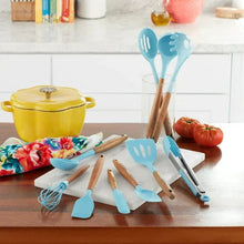 Blue silicone cooking utensils set with acacia wood handles, multiple tools