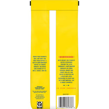 Ground coffee bag back panel with barcode and bilingual text, yellow