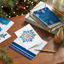 Hallmark blue and gold Christmas cards featuring snowflakes and a snowflake design