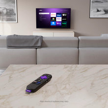 Black Roku voice remote with purple navigation pad and app shortcut buttons