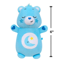 Blue plush bear toy with closed-eye smile and moon belly patch; upright 6-inch size view