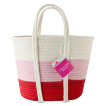 Cotton rope basket with pink and red stripes, white rope handles, product tag.