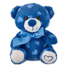 Blue plush bear with light heart pattern, white muzzle, and blue bow