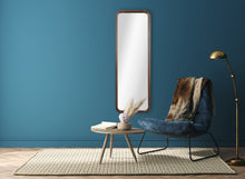 Vertical rectangular walnut wall mirror with rounded corners