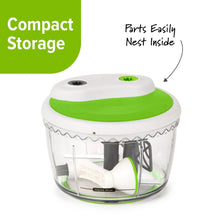 Two-speed chop and whip food processor with compact nested parts inside clear bowl