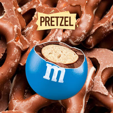 Blue candy shell with pretzel chip inside, surrounded by milk-chocolate pretzels