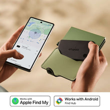 Green Bluetooth tracker card held in hand with smartphone map view