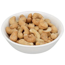 Salt and pepper cashews in a white bowl