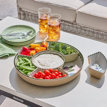 Bamboo melamine chip and dip tray in use with fresh veggies and dip in center