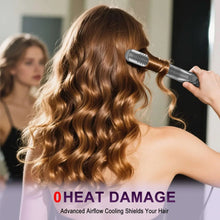 Airflow curling styler in use, creating loose curls while cooling the hair