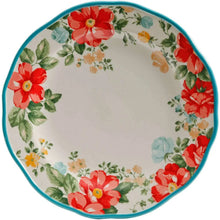 Floral dinner plate with teal rim and red, orange, and green flowers on white