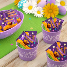 Easter candy assortment: purple buckets with small Caramello chocolate minis