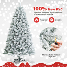Snow flocked artificial Christmas tree with dense branches