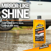 Wash and wax bottle with orange liquid for car exterior shine