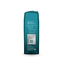 Back of teal whole bean coffee bag with brewing instructions and ingredients