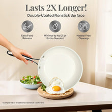 Cream nonstick frying pan with smooth interior and long handle