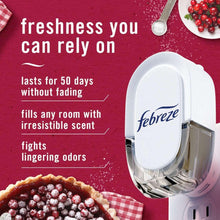 Febreze Plug air freshener device with white cover and scent oil refill unit