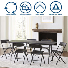 Black folding table set with flat rectangular tops and metal folding legs