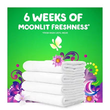 Promo panel with folded white towels and moonlit freshness text for detergent