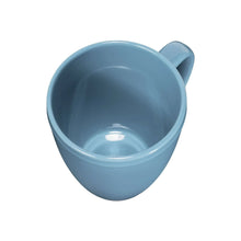 Blue stoneware mug showing interior and short side handle