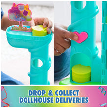 Teal dollhouse column with heart-shaped button and colorful delivery pieces