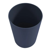 Dark blue plastic tumbler cup with wide rim, angled view