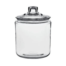 Wide-mouth glass storage jar with clear lid and round body, empty