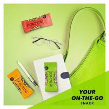 Assorted no-shell pistachios mini snack bags, including green and orange packs
