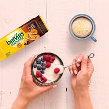 belVita dark chocolate creme breakfast sandwich biscuits with berries and a cup of coffee