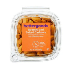 Roasted salted cashews in clear clamshell container, extra large pieces