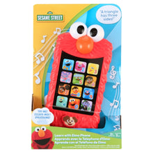 Retail box showing a red Elmo learning phone with character keypad and white eyes