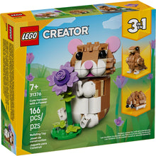 LEGO Creator hamster model with flower accessory, tan and white bricks in box view