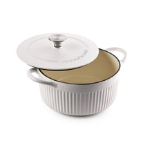 Enameled cast iron dutch oven with white lid and tan interior, ribbed sides, handles.