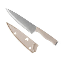 Ivory-handled chef knife and paring knife with beige blade cover details