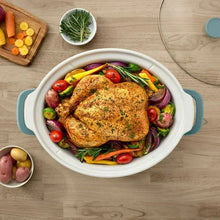 Crock-Pot slow cooker insert with roasted chicken and mixed vegetables