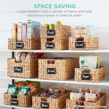 Stacked woven pantry baskets with labeled compartments for space saving