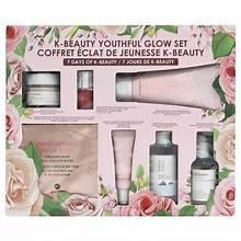 7-piece K-Beauty Youthful Glow set box with florals and skincare bottles display