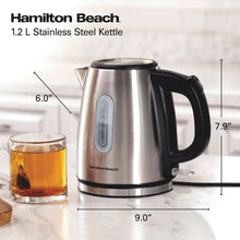 Stainless steel electric kettle with black handle and spout, shown with measurements