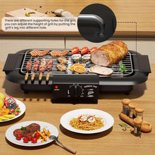 Electric smokeless grill with black control panel and wire rack, BBQ meats and veggies.