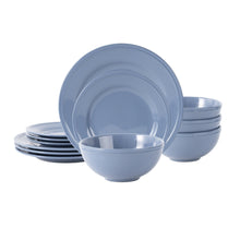 Blue stoneware dinnerware set with large plate and small bowls