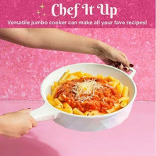 White iridescent jumbo cooker filled with pasta