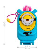 Blue Minions compact toy with large eyes, pink hair tuft, and purple ring handle