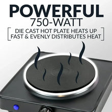 Single-burner hot plate with glowing heating coil and smooth black cooktop