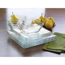 Clear square glass dinner plates and bowls with pear fruit