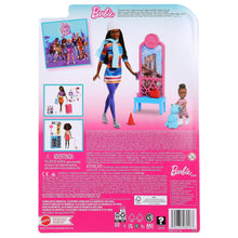 Ice skating doll playset box showing fashion doll, child doll, and pink ice stand